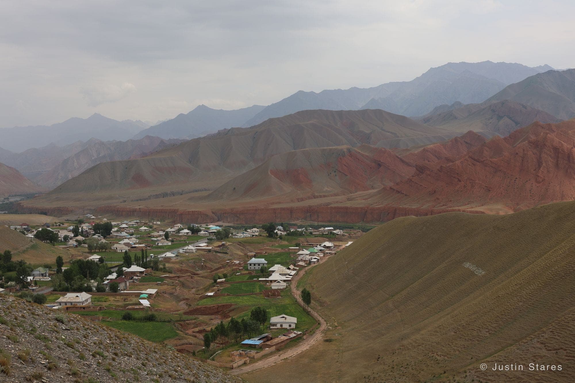Village Below the Red Hills